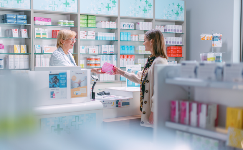 Woman at a phar,acy buying medication - pharmacy business broker - Armen Nazarian Business Brokers